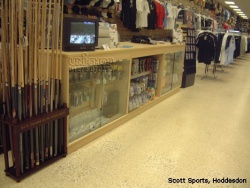 Slatwall with Slatwall fittings, Clothing Rails and Retail Counter at Scott Sports, Hoddesdon