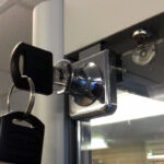 Close-Up Photo of a large aluminium glass shop display cabinets security lock
